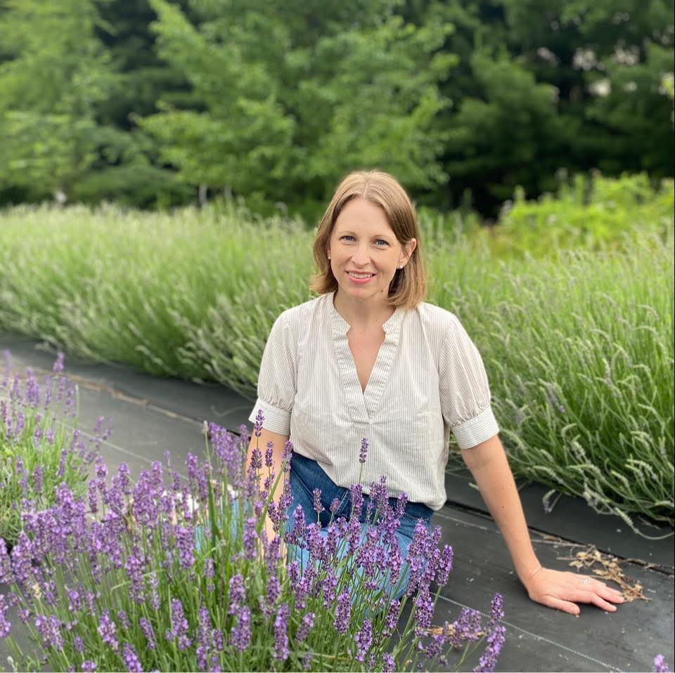 Marion Wiggins in the lavender field at Bloomfield Schoolhouse Lavender